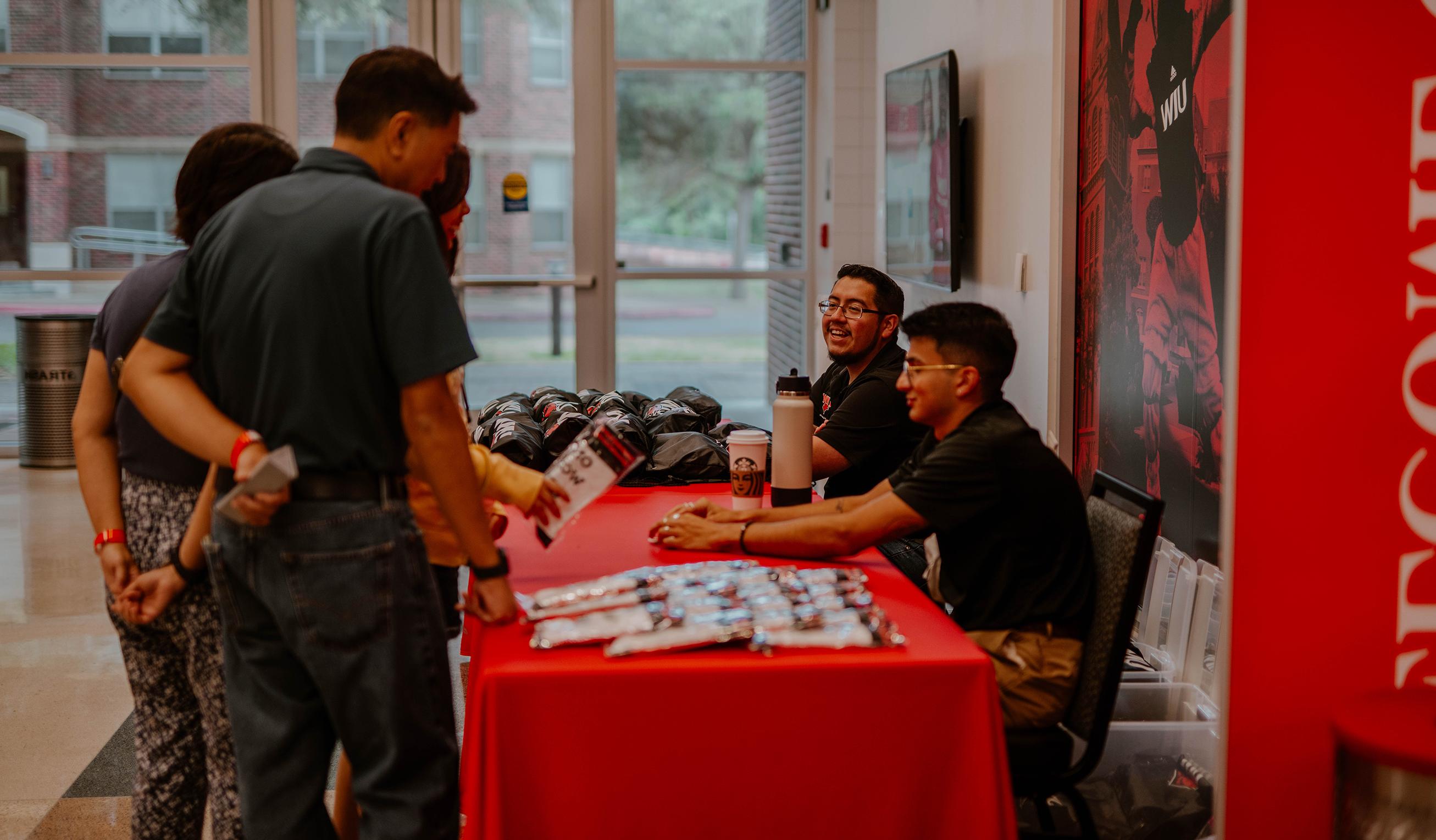 Counselors talking with students